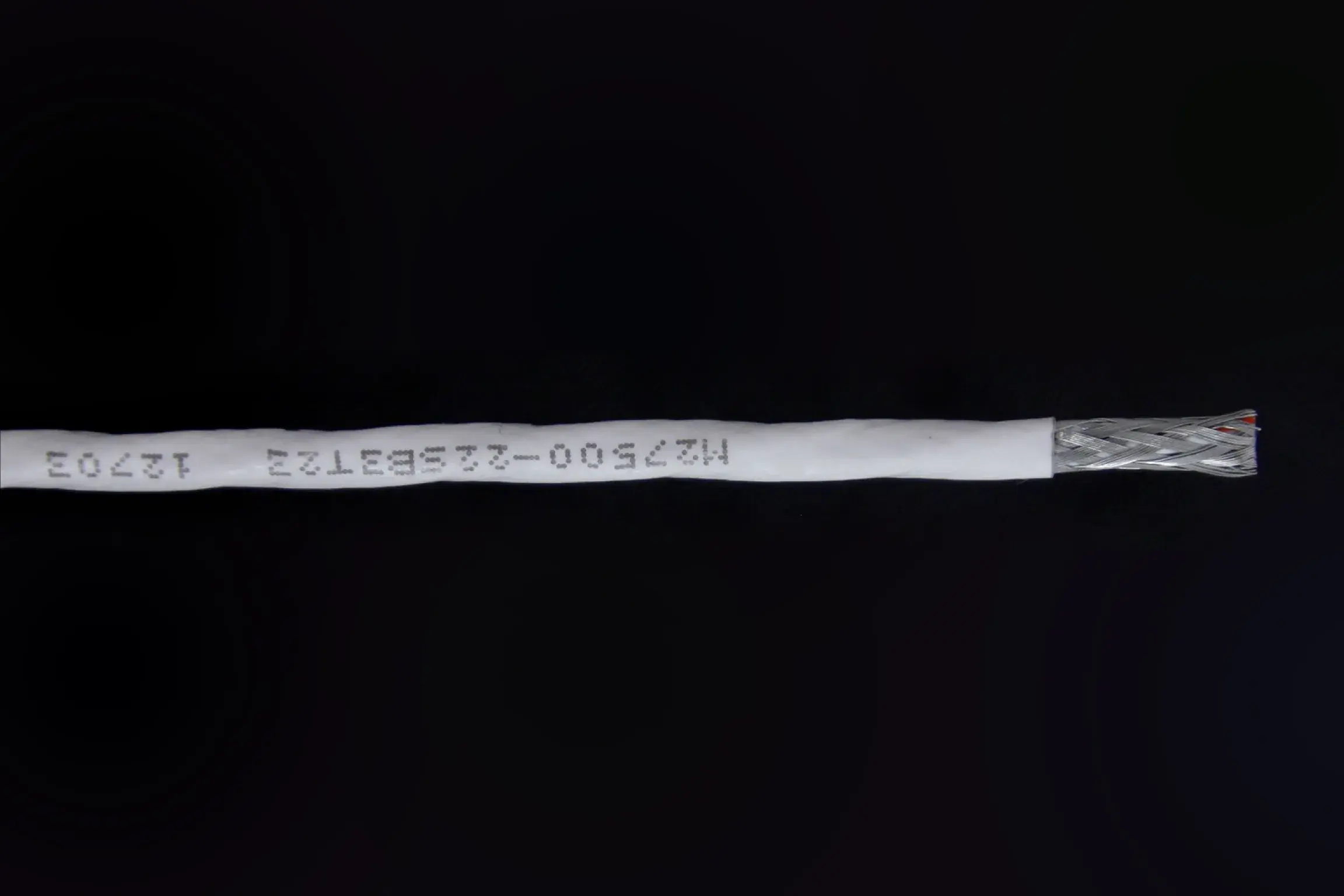 M27500-22SB3T23 12703 white colored wrapper for black wire.
