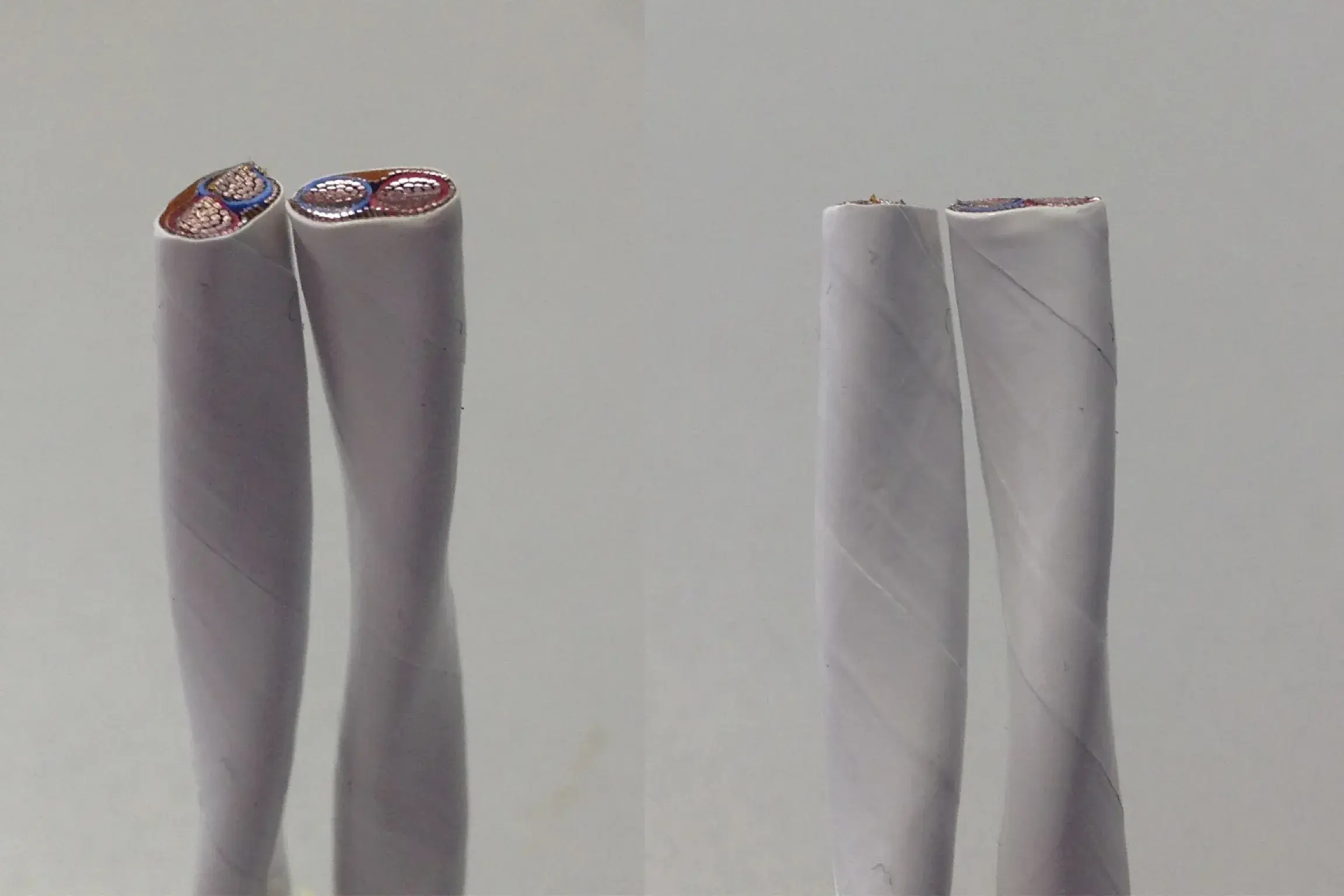 Gray and light gray wrapper for two wire of multi color inside it.